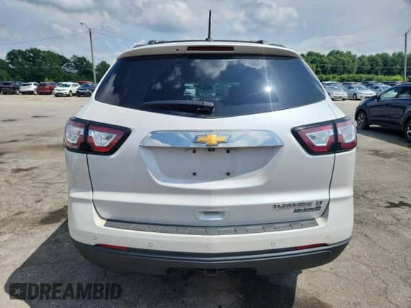 2016 Chevrolet Traverse LT with VIN 1GNKRGKD4GJ240851, listed as a Copart auction lot 62824275 with 99,928 mi miles and Salvage title. Bid and sale history available at DreamBid. Image 6.