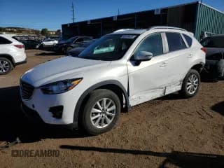 ✅ 2016 Mazda CX-5 Touring • VIN: JM3KE4CY6G0912216 • Lot: 90409635. Listed on Copart with 38,564 mi. Free auction sales archive from the USA and detailed vehicle history report at DreamBid. Image 1.