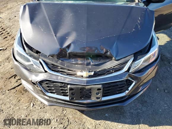 2017 Chevrolet Cruze LT z VIN 1G1BE5SM9H7234737, wystawiony jako Copart lot #69469422 z przebiegiem 41 545 mil mil oraz . Historia ofert i sprzedaży dostępna na DreamBid. Obrazek 12.