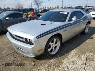 ✅ 2012 Dodge Challenger R/T Plus • VIN: 2C3CDYBT5CH154215 • Lot: 43069555. Wystawiony na Copart z przebiegiem 107 827 mil. Bezpłatny archiwum sprzedaży aukcyjnych z USA i szczegółowy raport historii pojazdu na DreamBid. Zdjęcie 1.