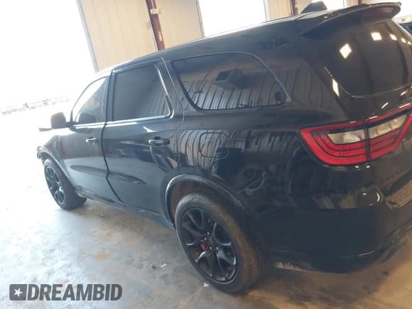 ✅ 2023 Dodge Durango SRT Hellcat • VIN: 1C4SDJH96PC695616 • Lot: 43569810. Listed on IAAI with 1,876 mi. Free auction sales archive from the USA and detailed vehicle history report at DreamBid. Image 14.