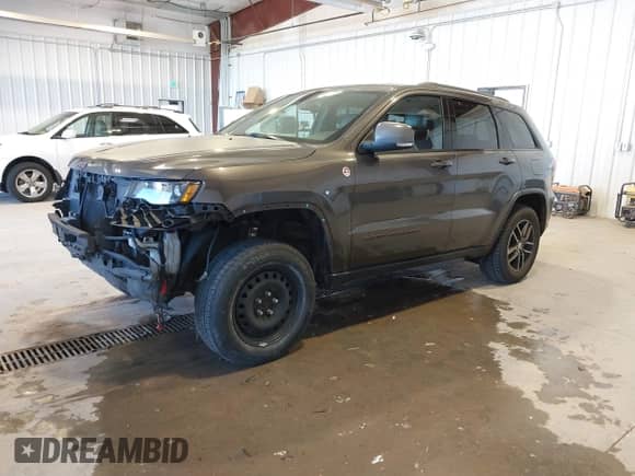 2017 Jeep Grand Cherokee Trailhawk with VIN 1C4RJFLG5HC651781, listed as a IAAI auction lot 43519696 with 120,213 mi miles and . Bid and sale history available at DreamBid. Image 17.
