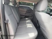 ✅ 2022 Toyota Tacoma SR • VIN: 3TYAX5GN0NT046399 • Лот: 64027795. Опубликован ранее на Copart с пробегом 56 910 миль. Бесплатный доступ к архиву аукционных продаж из США и подробный отчёт об истории автомобиля на DreamBid. Изображение 10.