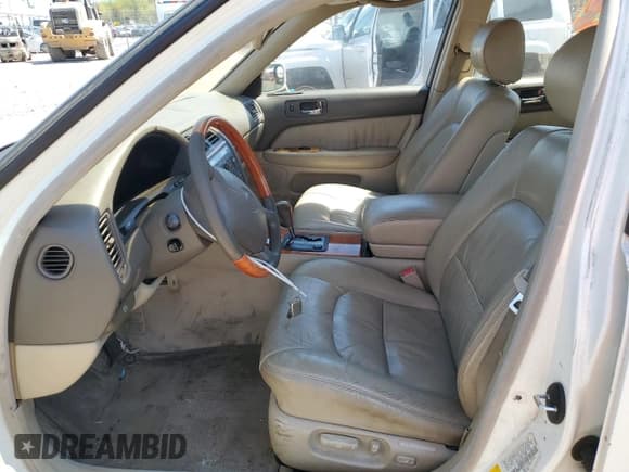 ✅ 1999 Lexus LS 400 • VIN: JT8BH28F9X0148064 • Lot: 52146454. Wystawiony na Copart z przebiegiem 170 320 mil. Bezpłatny archiwum sprzedaży aukcyjnych z USA i szczegółowy raport historii pojazdu na DreamBid. Zdjęcie 7.