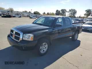 2006 Dodge Dakota SLT с VIN 1D7HE48N86S603955, выставлен на аукционе Copart как лот 81270004 с пробегом 156 586 миль миль и Чистый • Clean title. История ставок и продаж доступна на DreamBid. Изображение 1.