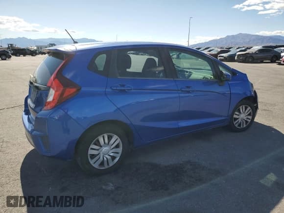 ✅ 2015 Honda Fit LX • VIN: 3HGGK5H50FM780370 • Lot: 57227015. Listed on Copart with 104,285 mi. Free auction sales archive from the USA and detailed vehicle history report at DreamBid. Image 3.