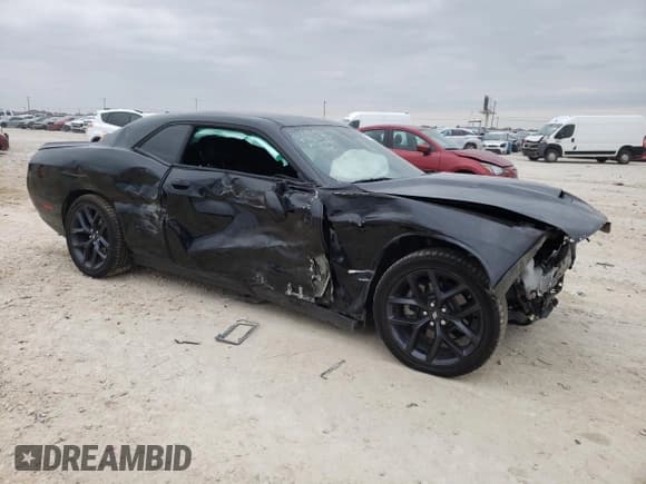 ✅ 2022 Dodge Challenger R/T • VIN: 2C3CDZBT8NH253992 • Lot: 77411413. Wystawiony na Copart z przebiegiem 20 372 mil. Bezpłatny archiwum sprzedaży aukcyjnych z USA i szczegółowy raport historii pojazdu na DreamBid. Zdjęcie 4.