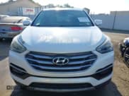 ✅ 2018 Hyundai Santa Fe 2.4L • VIN: 5NMZT3LB6JH086039 • Лот: 43639604. Опубликован ранее на IAAI с пробегом 90 196 миль. Бесплатный доступ к архиву аукционных продаж из США и подробный отчёт об истории автомобиля на DreamBid. Изображение 12.