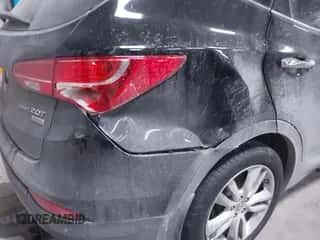 2013 Hyundai Santa Fe Sport z VIN 5XYZUDLA7DG114147, wystawiony jako IAAI lot #41369887 z przebiegiem 92 919 mil mil oraz . Historia ofert i sprzedaży dostępna na DreamBid. Obrazek 6.