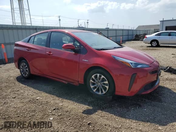 2021 Toyota Prius L Eco with VIN JTDKAMFU9M3134940, listed as a Copart auction lot 71632875 with 34,382 mi miles and Salvage title. Bid and sale history available at DreamBid. Image 4.