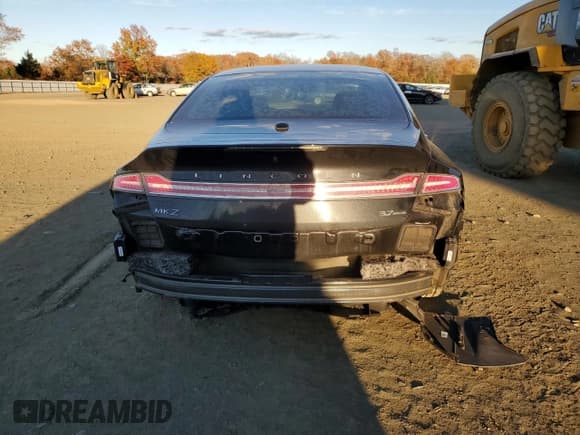 ✅ 2015 Lincoln MKZ • VIN: 3LN6L2JK2FR617403 • Lot: 90760715. Wystawiony na Copart z przebiegiem 128 703 mil. Bezpłatny archiwum sprzedaży aukcyjnych z USA i szczegółowy raport historii pojazdu na DreamBid. Zdjęcie 6.