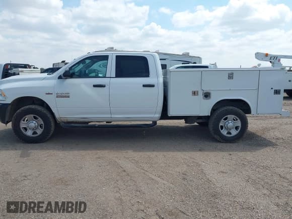 ✅ 2016 Ram 2500 Tradesman • VIN: 3C7WR5HT0GG125424 • Lot: 43041693. Wystawiony na IAAI z przebiegiem 171 693 mil. Bezpłatny archiwum sprzedaży aukcyjnych z USA i szczegółowy raport historii pojazdu na DreamBid. Zdjęcie 14.