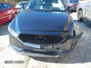 ✅ 2021 Mazda CX-5 Grand Touring • VIN: JM3KFBDMXM1348976 • Lot: 43503639. Listed on IAAI with 42,147 mi. Free auction sales archive from the USA and detailed vehicle history report at DreamBid. Image 11.