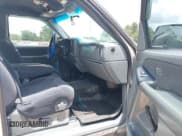 ✅ 1999 GMC Sierra 1500 SLE • VIN: 1GTEK19T7XE515464 • Лот: 42699845. Опубликован ранее на IAAI с пробегом 239 544 миль. Бесплатный доступ к архиву аукционных продаж из США и подробный отчёт об истории автомобиля на DreamBid. Изображение 5.