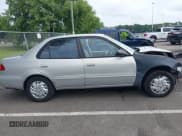 ✅ 1999 Toyota Corolla VE • VIN: 2T1BR12E9XC180124 • Lot: 42989717. Listed on IAAI with 184,062 mi. Free auction sales archive from the USA and detailed vehicle history report at DreamBid. Image 13.