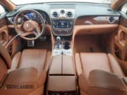 ✅ 2017 Bentley Bentayga W12 • VIN: SJAAC2ZV0HC015387 • Лот: 53551835. Опубликован ранее на Copart с пробегом 38 573 миль. Бесплатный доступ к архиву аукционных продаж из США и подробный отчёт об истории автомобиля на DreamBid. Изображение 8.