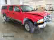 2004 Dodge Dakota SLT z VIN 1D7HG48N54S509927, wystawiony jako Copart lot #71685514 z przebiegiem 145 060 mil mil oraz Szkoda całkowita • Salvage title. Historia ofert i sprzedaży dostępna na DreamBid. Obrazek 4.