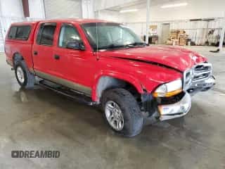 2004 Dodge Dakota SLT z VIN 1D7HG48N54S509927, wystawiony jako Copart lot #71685514 z przebiegiem 145 060 mil mil oraz Szkoda całkowita • Salvage title. Historia ofert i sprzedaży dostępna na DreamBid. Obrazek 4.