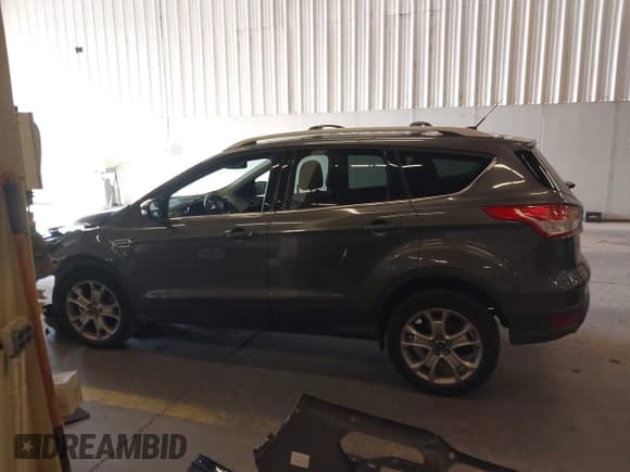 ✅ 2015 Ford Escape Titanium • VIN: 1FMCU9J98FUC05727 • Lot: 42229328. Listed on IAAI with 112,896 mi. Free auction sales archive from the USA and detailed vehicle history report at DreamBid. Image 15.