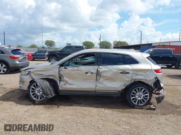 ✅ 2015 Lincoln MKC • VIN: 5LMCJ1A94FUJ25512 • Лот: 42573095. Опубликован ранее на IAAI с пробегом 257 846 миль. Бесплатный доступ к архиву аукционных продаж из США и подробный отчёт об истории автомобиля на DreamBid. Изображение 14.