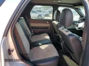 ✅ 2009 Mercury Mariner Premier • VIN: 4M2CU97G99KJ00781 • Lot: 52553025. Wystawiony na Copart z przebiegiem 203 719 mil. Bezpłatny archiwum sprzedaży aukcyjnych z USA i szczegółowy raport historii pojazdu na DreamBid. Zdjęcie 11.