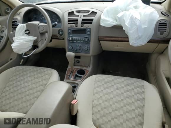 2005 Chevrolet Malibu LS z VIN 1G1ZT54825F274812, wystawiony jako Copart lot #77692784 z przebiegiem 138 306 mil mil oraz Szkoda całkowita • Salvage title. Historia ofert i sprzedaży dostępna na DreamBid. Obrazek 8.