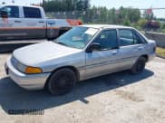 ✅ 1995 Ford Escort • VIN: 1FASP14J7SW307619 • Lot: 42440199. Listed on IAAI with 199,793 mi. Free auction sales archive from the USA and detailed vehicle history report at DreamBid. Image 2.