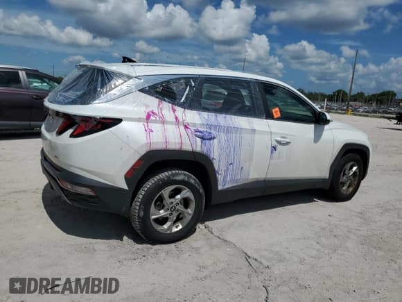 ✅ 2022 Hyundai Tucson SE • VIN: 5NMJACAE7NH023019 • Лот: 64854244. Опубликован ранее на Copart с пробегом Не указан. Бесплатный доступ к архиву аукционных продаж из США и подробный отчёт об истории автомобиля на DreamBid. Изображение 3.