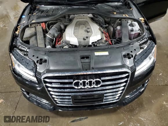 ✅ 2018 Audi A8 • VIN: WAU44AFD3JN000615 • Лот: 89826845. Опубликован ранее на Copart с пробегом 85 904 миль. Бесплатный доступ к архиву аукционных продаж из США и подробный отчёт об истории автомобиля на DreamBid. Изображение 11.