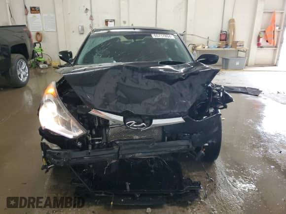 2014 Hyundai Veloster z VIN KMHTC6AD2EU208868, wystawiony jako Copart lot #65717864 z przebiegiem 150 225 mil mil oraz Szkoda całkowita • Salvage title. Historia ofert i sprzedaży dostępna na DreamBid. Obrazek 5.