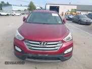 ✅ 2014 Hyundai Santa Fe • VIN: 5XYZUDLB4EG154146 • Lot: 43234913. Listed on IAAI with 184,050 mi. Free auction sales archive from the USA and detailed vehicle history report at DreamBid. Image 12.