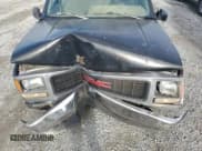 ✅ 1996 GMC Sierra 1500 • VIN: 1GTEC14W3TZ525751 • Лот: 85170165. Опубликован ранее на Copart с пробегом Не указан. Бесплатный доступ к архиву аукционных продаж из США и подробный отчёт об истории автомобиля на DreamBid. Изображение 11.