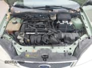 ✅ 2007 Ford Focus S • VIN: 1FAFP34N17W239888 • Lot: 43402571. Listed on IAAI with 269,023 mi. Free auction sales archive from the USA and detailed vehicle history report at DreamBid. Image 10.