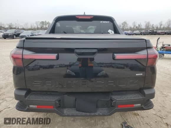 2024 Hyundai Santa Cruz SEL с VIN 5NTJBDAE2RH083660, выставлен на аукционе Copart как лот 44815465 с пробегом Не указан миль и Списание • Salvage title. История ставок и продаж доступна на DreamBid. Изображение 6.