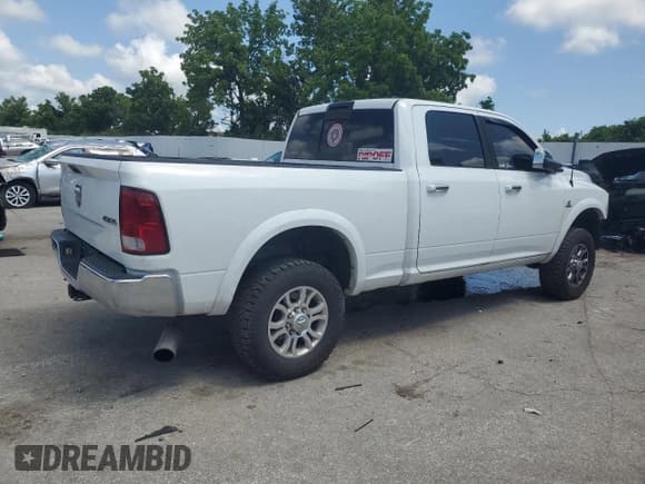 ✅ 2012 Ram 2500 Laramie • VIN: 3C6UD5FL8CG174359 • Lot: 63321605. Listed on Copart with 300,972 mi. Free auction sales archive from the USA and detailed vehicle history report at DreamBid. Image 3.