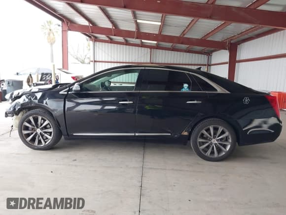 ✅ 2013 Cadillac XTS Livery • VIN: 2G61W5S33D9164395 • Lot: 41793791. Listed on IAAI with 421,499 mi. Free auction sales archive from the USA and detailed vehicle history report at DreamBid. Image 14.