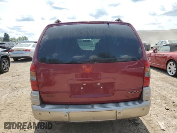 ✅ 2004 Pontiac Montana w/1SE Pkg • VIN: 1GMDX13E64D116162 • Лот: 66928304. Опубликован ранее на Copart с пробегом 133 618 миль. Бесплатный доступ к архиву аукционных продаж из США и подробный отчёт об истории автомобиля на DreamBid. Изображение 6.