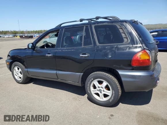 ✅ 2004 Hyundai Santa Fe GLS • VIN: KM8SC13E54U700457 • Lot: 53755855. Listed on Copart with 101,565 mi. Free auction sales archive from the USA and detailed vehicle history report at DreamBid. Image 2.