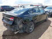 ✅ 2017 Ford Fusion S • VIN: 3FA6P0G70HR342459 • Lot: 43204404. Listed on IAAI with 125,404 mi. Free auction sales archive from the USA and detailed vehicle history report at DreamBid. Image 4.