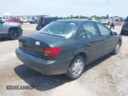 ✅ 2000 Saturn SL • VIN: 1G8ZH5280YZ180615 • Lot: 42491523. Wystawiony na IAAI z przebiegiem 157 550 mil. Bezpłatny archiwum sprzedaży aukcyjnych z USA i szczegółowy raport historii pojazdu na DreamBid. Zdjęcie 4.