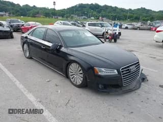 ✅ 2015 Audi A8 4.0T • VIN: WAU32AFD9FN009649 • Lot: 42367874. Wystawiony na IAAI z przebiegiem 138 462 mil. Bezpłatny archiwum sprzedaży aukcyjnych z USA i szczegółowy raport historii pojazdu na DreamBid. Zdjęcie 1.