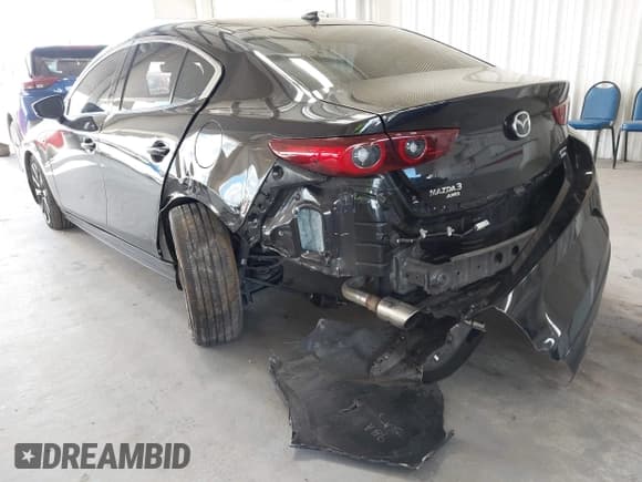 ✅ 2022 Mazda 3 2.5 Turbo • VIN: 3MZBPBAY5NM312661 • Лот: 43445124. Опубликован ранее на IAAI с пробегом 26 788 миль. Бесплатный доступ к архиву аукционных продаж из США и подробный отчёт об истории автомобиля на DreamBid. Изображение 3.