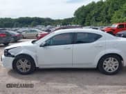 ✅ 2012 Dodge Avenger SE • VIN: 1C3CDZAB1CN310501 • Lot: 43096260. Listed on IAAI with 151,434 mi. Free auction sales archive from the USA and detailed vehicle history report at DreamBid. Image 14.