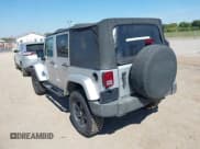 ✅ 2007 Jeep Wrangler Unlimited Sahara • VIN: 1J4GA591X7L101991 • Lot: 43233527. Listed on IAAI with 156,024 mi. Free auction sales archive from the USA and detailed vehicle history report at DreamBid. Image 3.