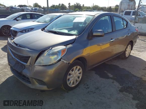 ✅ 2012 Nissan Versa SV • VIN: 3N1CN7AP3CL858236 • Lot: 43421934. Wystawiony na IAAI z przebiegiem 84 428 mil. Bezpłatny archiwum sprzedaży aukcyjnych z USA i szczegółowy raport historii pojazdu na DreamBid. Zdjęcie 2.