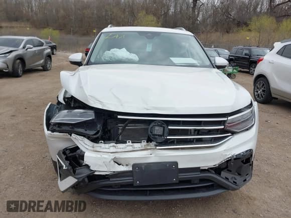 ✅ 2023 Volkswagen Tiguan SE • VIN: 3VVNB7AX4PM100180 • Lot: 42062208. Listed on IAAI with 12,922 mi. Free auction sales archive from the USA and detailed vehicle history report at DreamBid. Image 12.