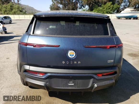 ✅ 2023 Fisker Ocean One • VIN: VCF1ZBU27PG001925 • Lot: 65253054. Listed on Copart with 5,757 mi. Free auction sales archive from the USA and detailed vehicle history report at DreamBid. Image 6.