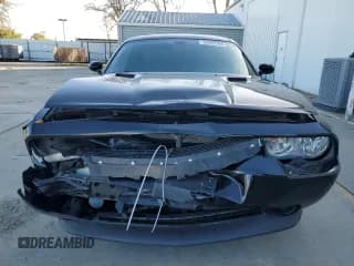 ✅ 2013 Dodge Challenger SXT • VIN: 2C3CDYAG2DH670263 • Lot: 86909704. Wystawiony na Copart z przebiegiem 121 614 mil. Bezpłatny archiwum sprzedaży aukcyjnych z USA i szczegółowy raport historii pojazdu na DreamBid. Zdjęcie 5.