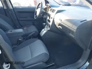 ✅ 2009 Dodge Caliber SXT • VIN: 1B3HB48A29D131147 • Lot: 43722865. Listed on IAAI with 256,288 mi. Free auction sales archive from the USA and detailed vehicle history report at DreamBid. Image 5.