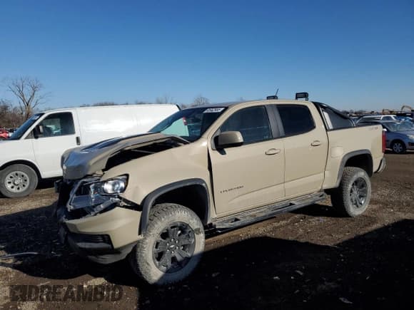 ✅ 2021 Chevrolet Colorado 4WD ZR2 • VIN: 1GCGTEEN2M1131888 • Лот: 43362985. Опубликован ранее на Copart с пробегом 51 223 миль. Бесплатный доступ к архиву аукционных продаж из США и подробный отчёт об истории автомобиля на DreamBid. Изображение 1.